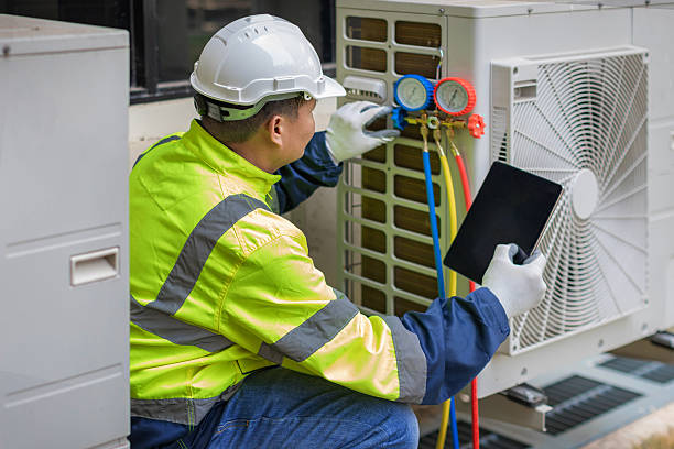 Professional Air Conditioning Repair technician working in Saint Stephen, MN